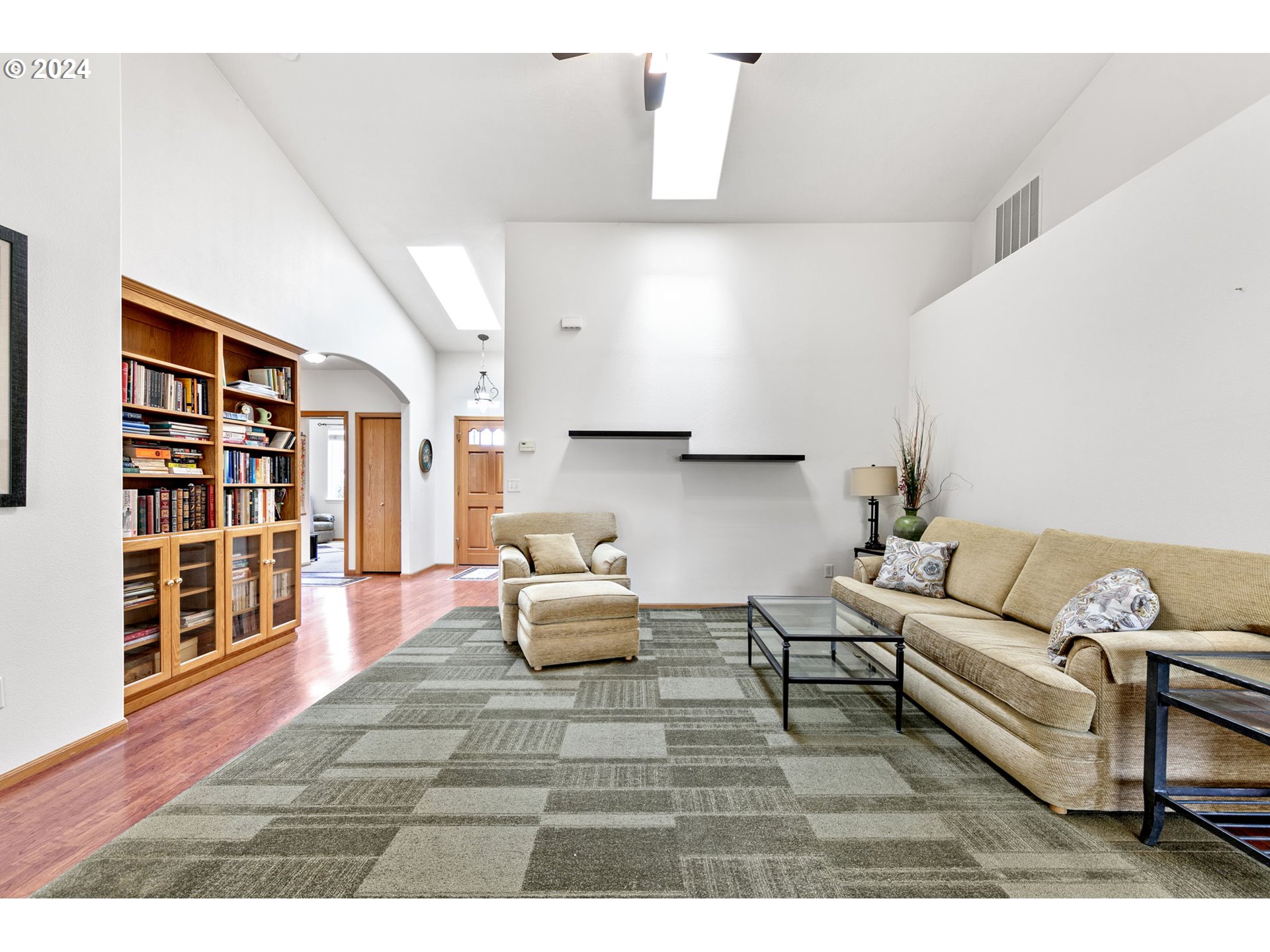 815 R Street Springfield, OR 97477 - Photo 13 of 37 a living room with furniture and a book shelf