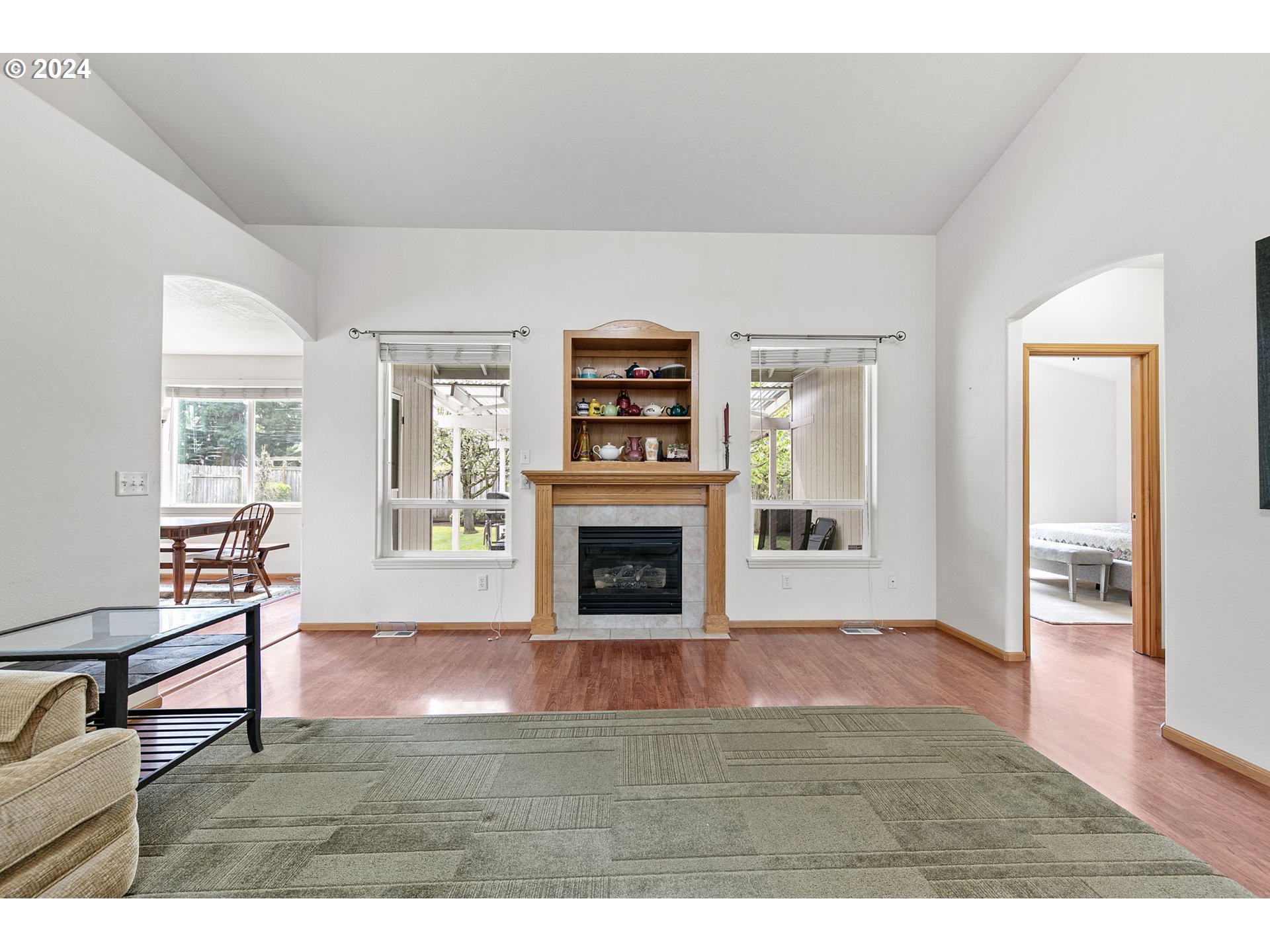 815 R Street Springfield, OR 97477 - Photo 8 of 37 a living room with furniture and a fireplace