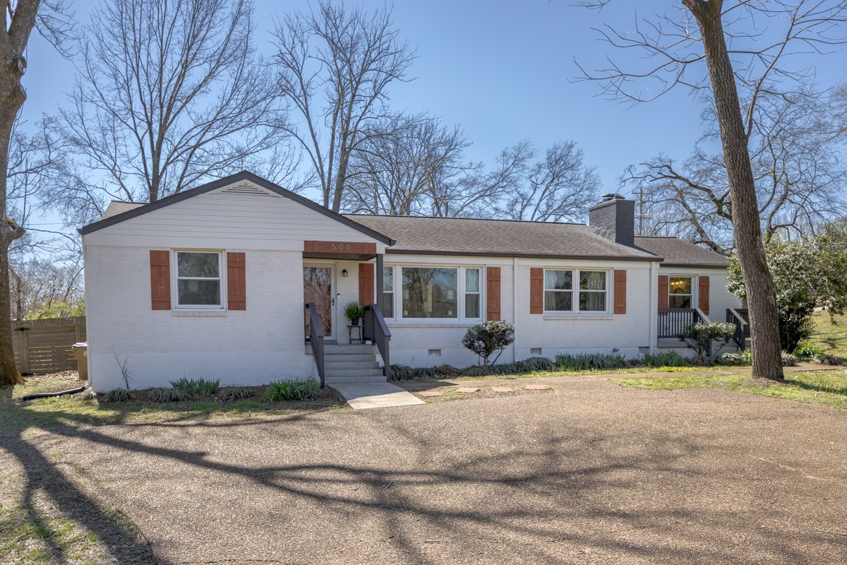 500 Vantrease Road Madison, TN 37115 - Photo 23 of 24 a front view of a house with a yard and garage