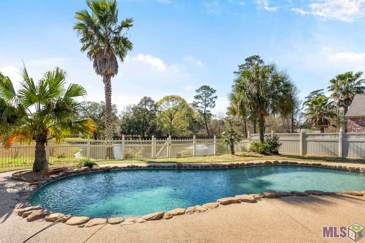 9324 Homestead Drive Baton Rouge, LA 70817 - Photo 6 of 25 The Pool & Lake Make This an Incredible Backyard Retreat