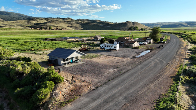 890 East Hatchery Road Bicknell, UT 84715 - Photo 5 of 48 View of rural area featuring a mountain backdrop