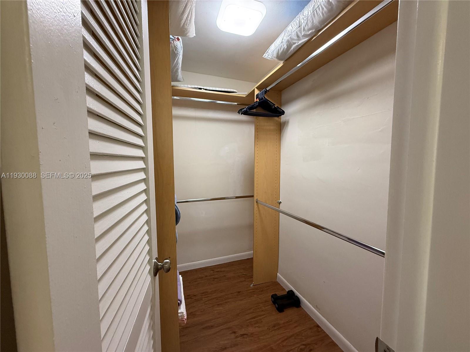 900 Tallwood Avenue, Unit 306 Hollywood, FL 33021 - Photo 20 of 30 a view of a room with wooden floor