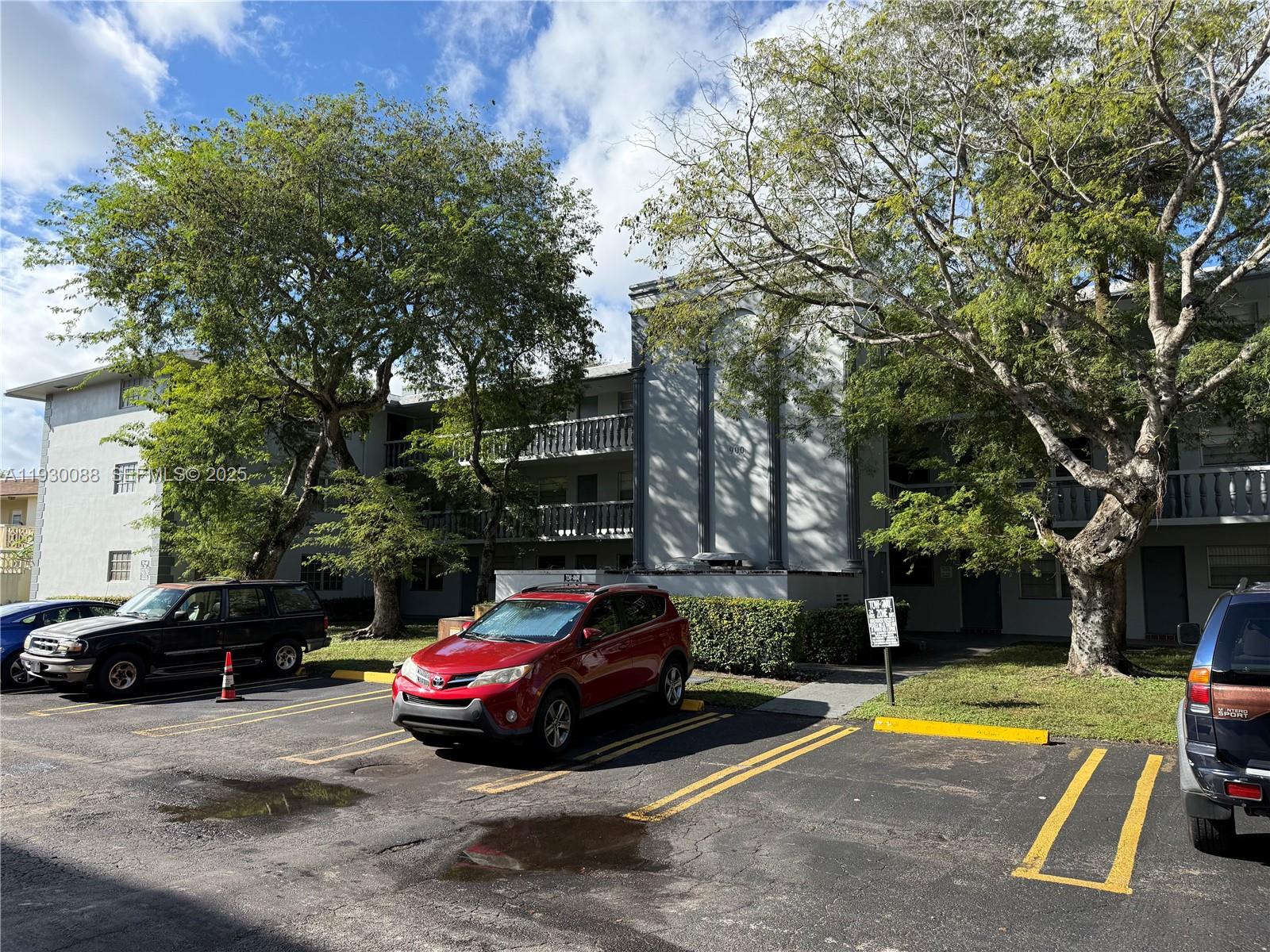 900 Tallwood Avenue, Unit 306 Hollywood, FL 33021 - Photo 28 of 30 a view of a street with cars