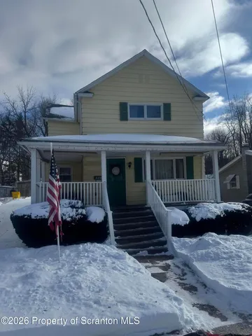 a view of a house with a patio