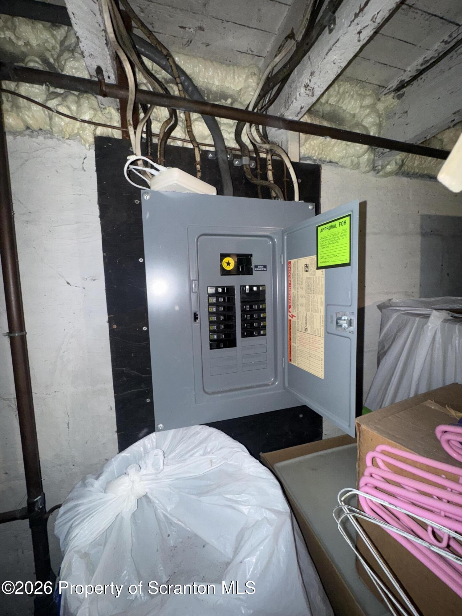 203 Laurel Street Archbald, PA 18403 - Photo 24 of 28 a bedroom with a bed and a walk in closet