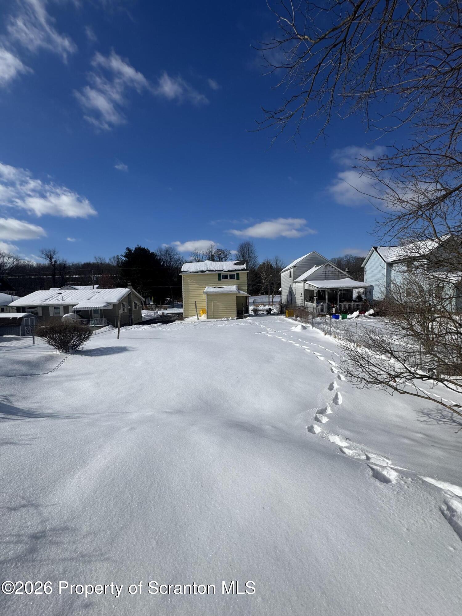 203 Laurel Street Archbald, PA 18403 - Photo 25 of 28 a view of street with parked cars