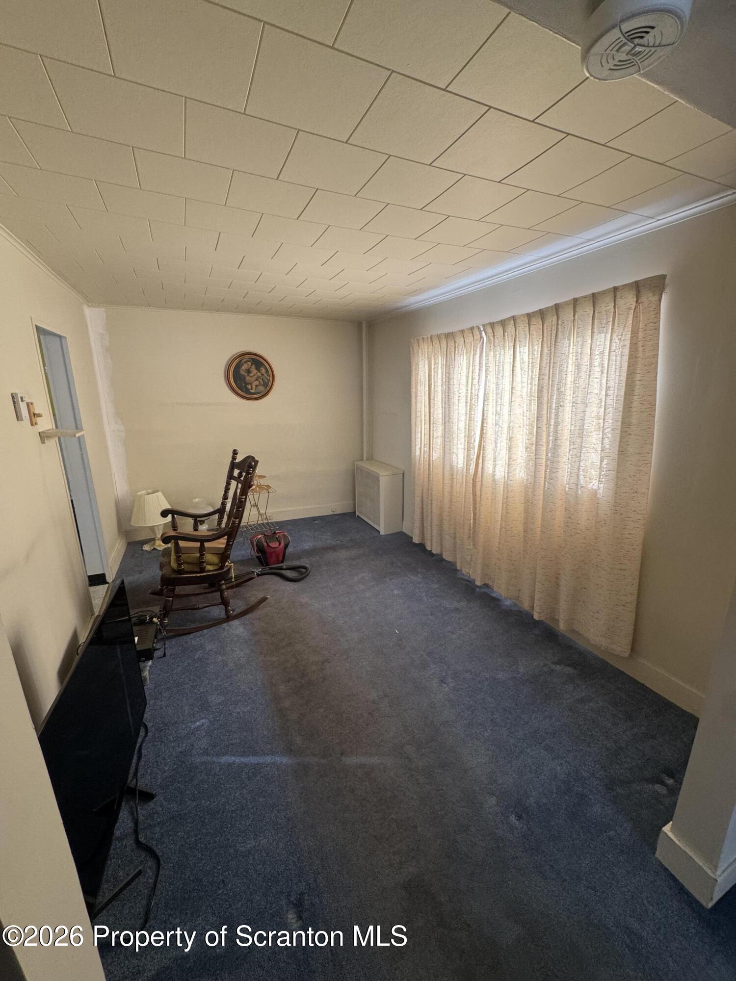203 Laurel Street Archbald, PA 18403 - Photo 9 of 28 a view of a room with furniture and windows