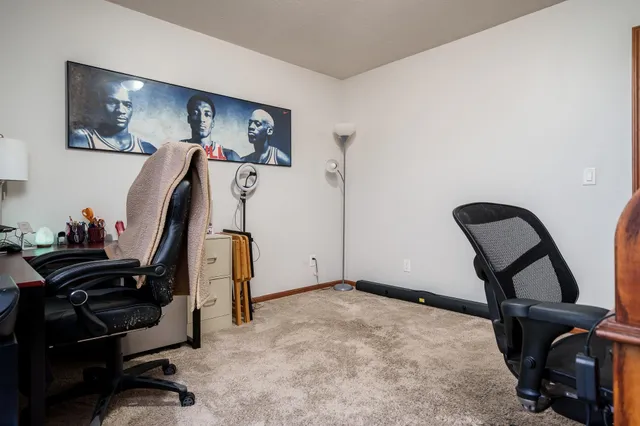 a bathroom with a toilet a sink and a mirror