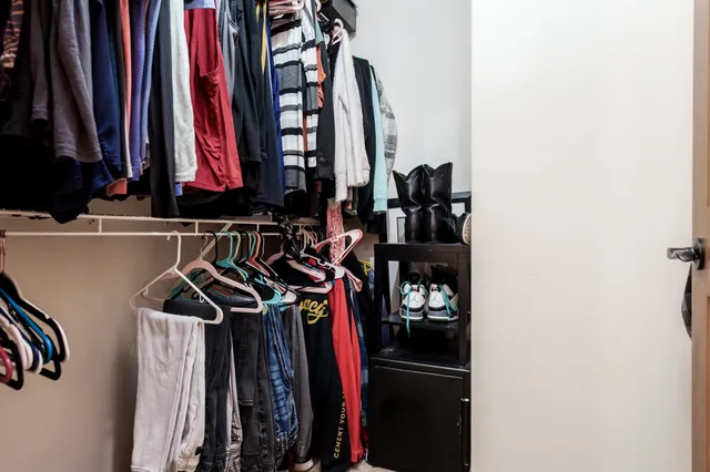 a view of a house with a yard and deck