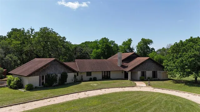 a view of swimming pool with a yard