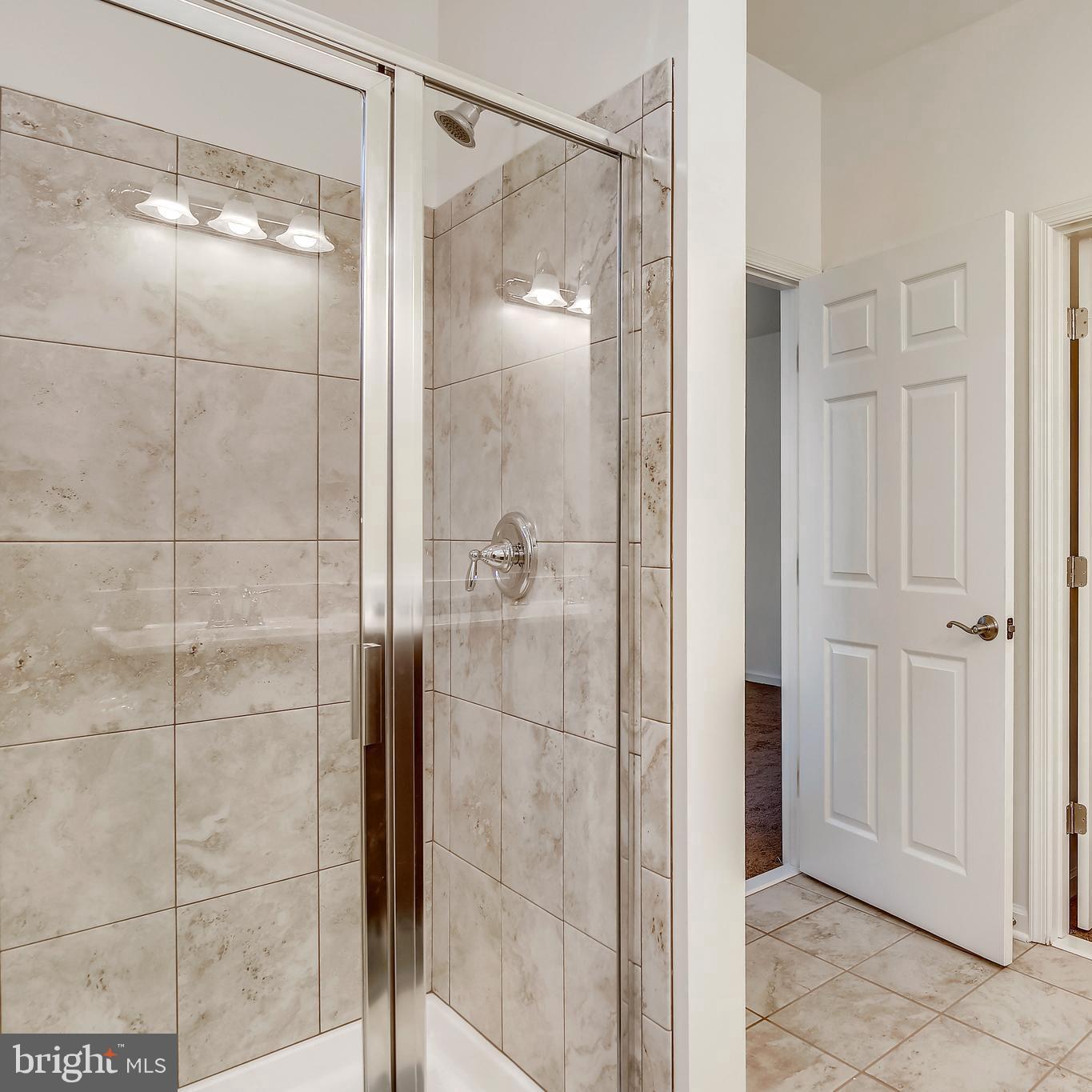 1 Cedar Ridge Road Rapidan, VA 22733 - Photo 9 of 13 a bathroom that has a glass shower door