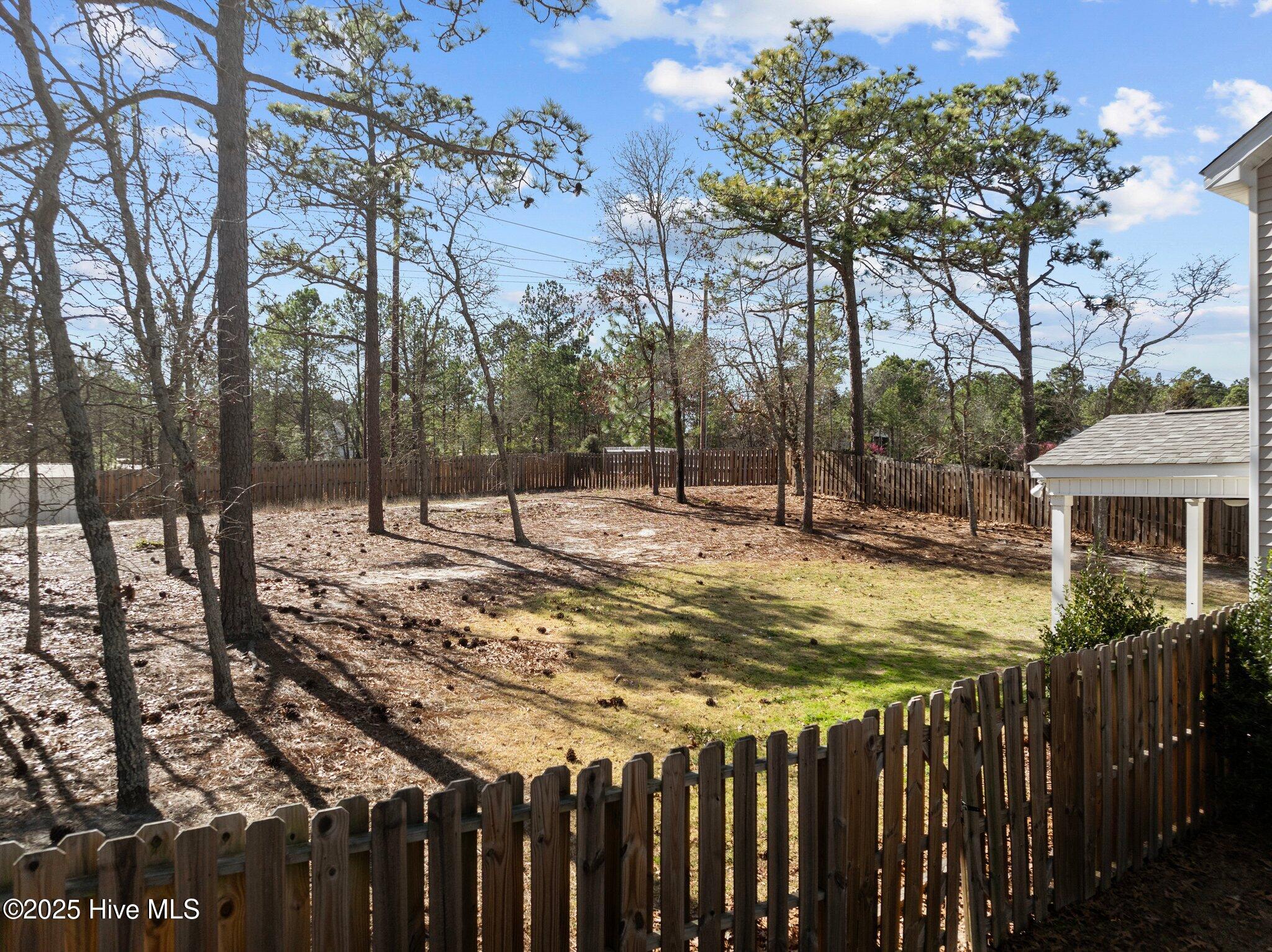 1205 Burning Tree Road Pinehurst, NC 28374 - Photo 27 of 35 Fenced Back Yard