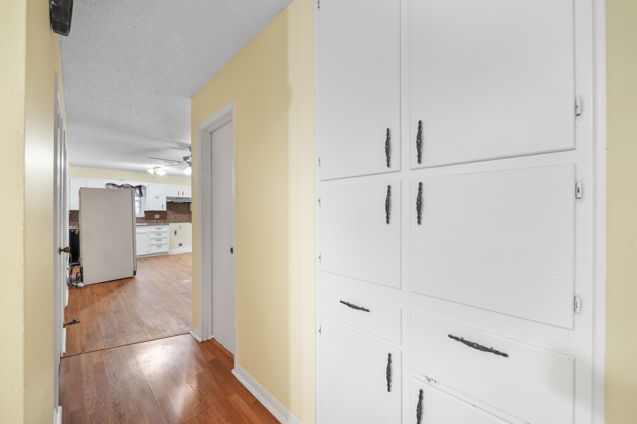 2217 Old Chappell Hill Road Brenham, TX 77833 - Photo 12 of 28 a view of a hallway with wooden floor
