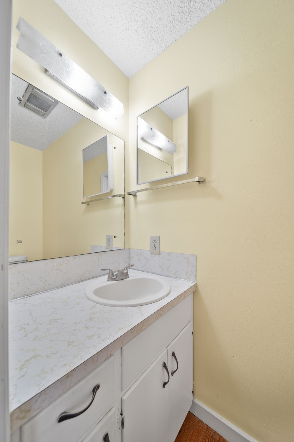 2217 Old Chappell Hill Road Brenham, TX 77833 - Photo 14 of 28 a bathroom with a sink and a mirror