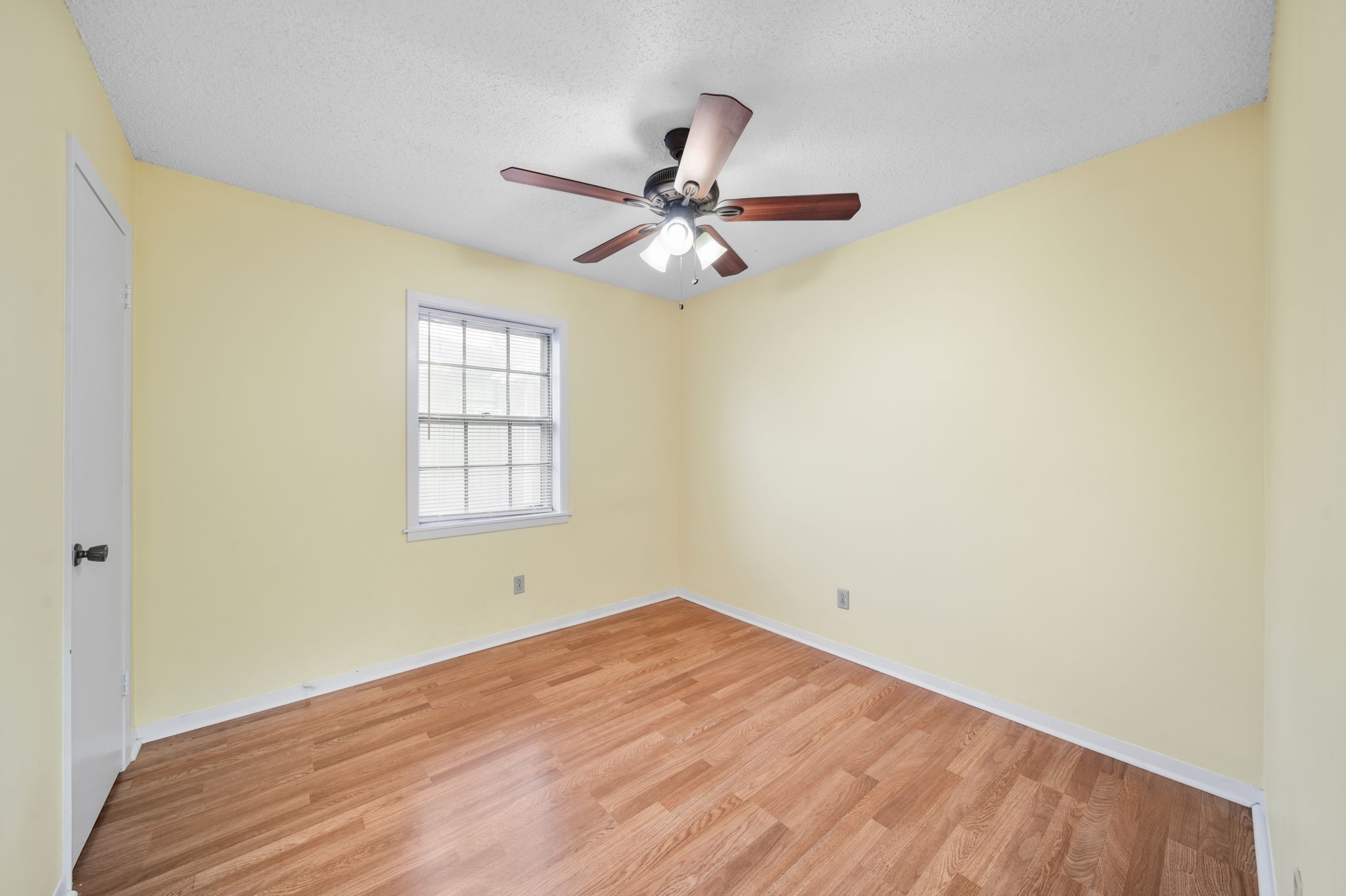 2217 Old Chappell Hill Road Brenham, TX 77833 - Photo 16 of 28 a view of a room with a window and ceiling fan