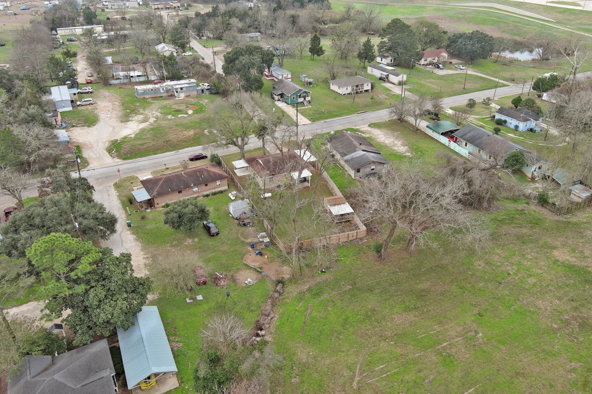 2217 Old Chappell Hill Road Brenham, TX 77833 - Photo 25 of 28 an aerial view of residential houses with outdoor space