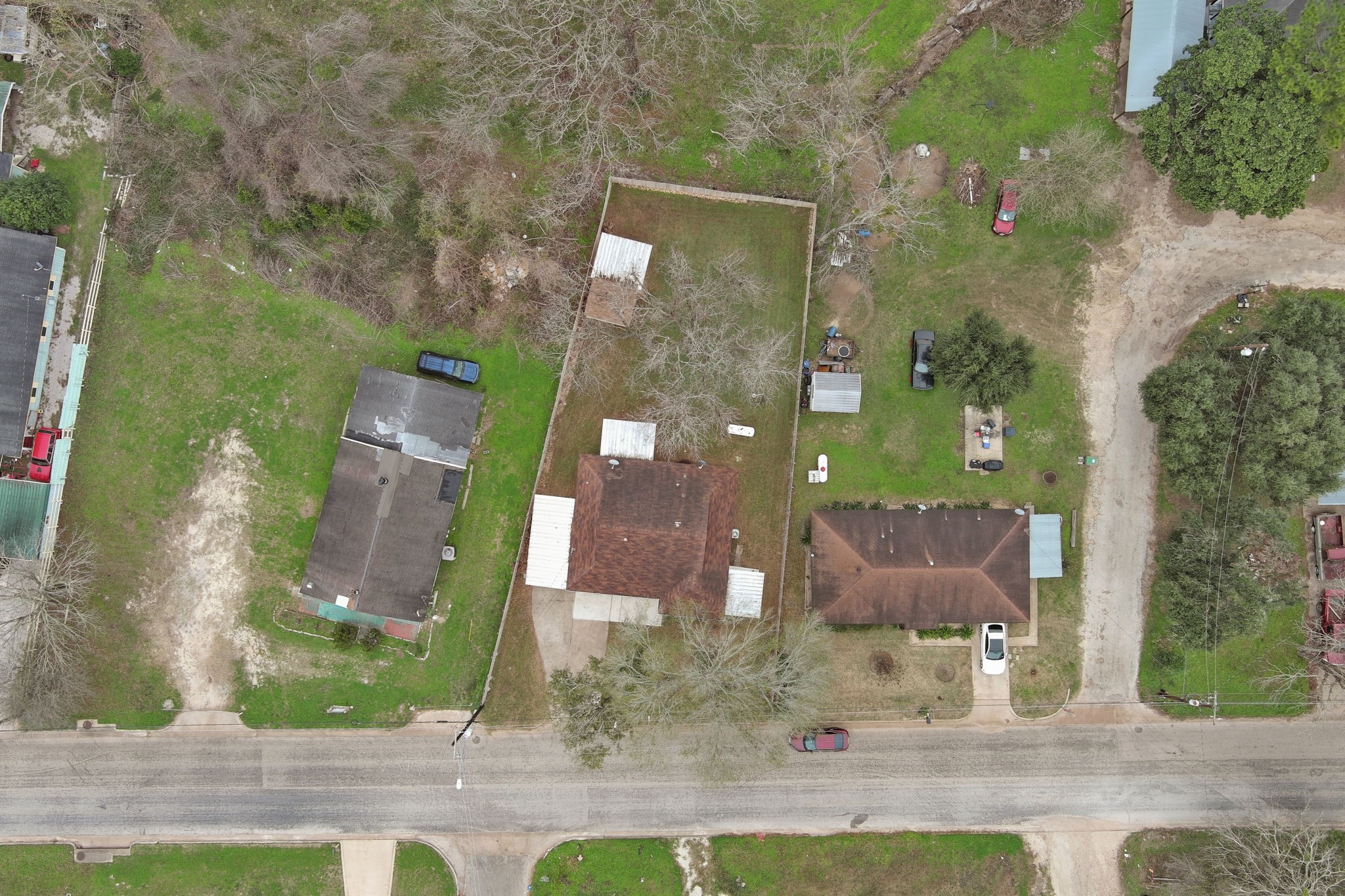 2217 Old Chappell Hill Road Brenham, TX 77833 - Photo 26 of 28 an aerial view of a house with a yard