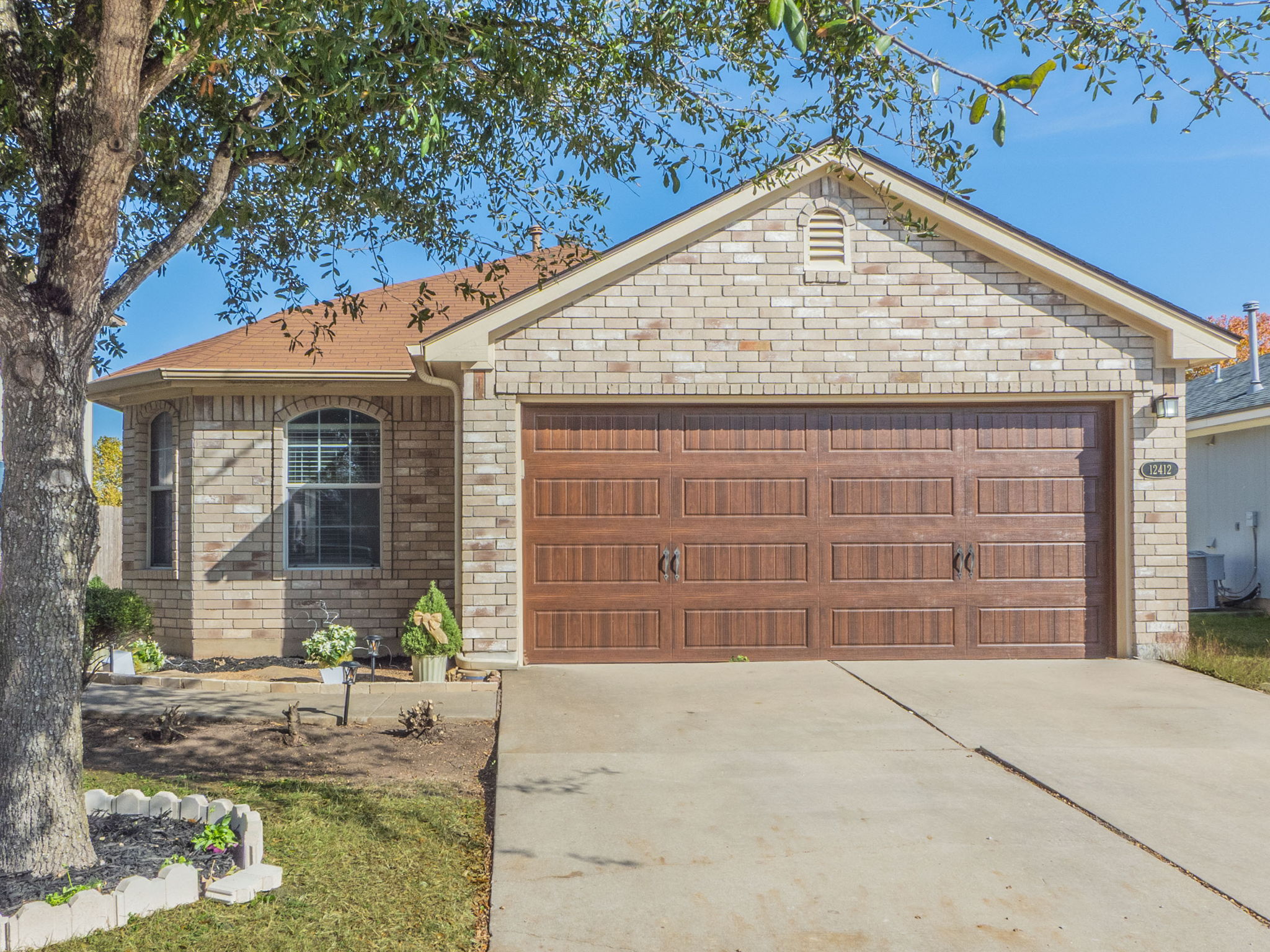 a view of backyard with a garden and plants