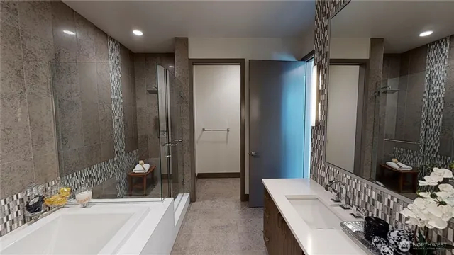 a bathroom with a double vanity sink and mirror