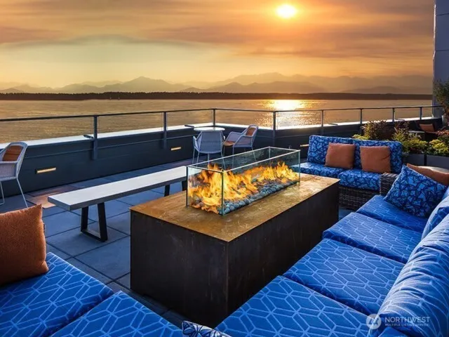 a view of a terrace with seating area and furniture