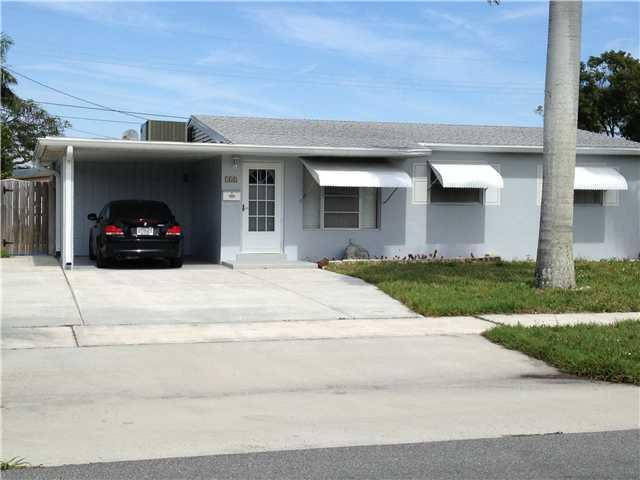 348 Mid Pines Road Palm Springs, FL 33461 - Photo 1 of 10 Exterior Front