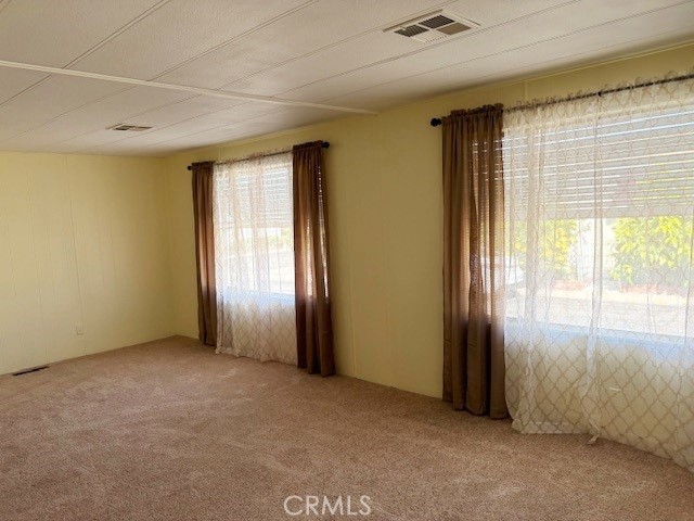 14851 Jeffrey Road, Unit 326 Irvine, CA 92618 - Photo 5 of 13 an empty room with windows