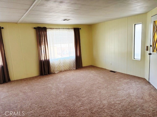 14851 Jeffrey Road, Unit 326 Irvine, CA 92618 - Photo 6 of 13 an empty room with windows