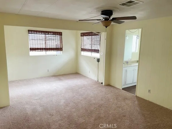 an empty room with windows