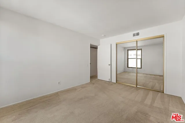 an empty room with window