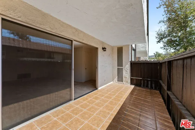 a balcony view with a outdoor space