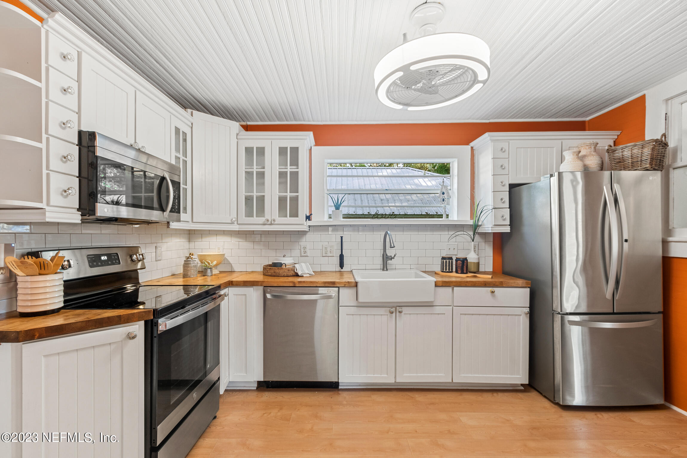 11 Newcomb Street St. Augustine, FL 32084 - Photo 11 of 35 a kitchen with stainless steel appliances a sink a stove a refrigerator and cabinets