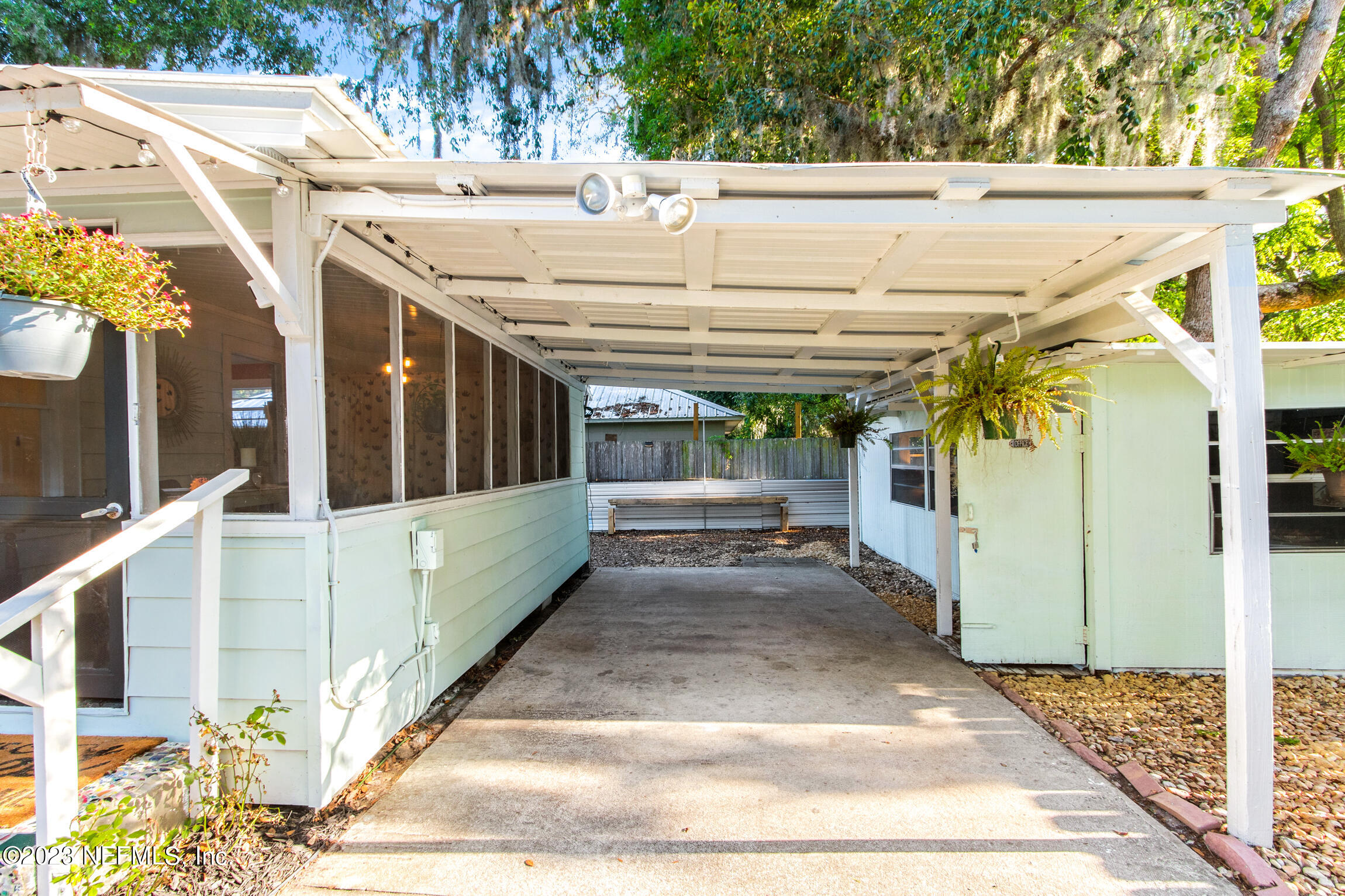 11 Newcomb Street St. Augustine, FL 32084 - Photo 27 of 35 a view of a patio with table and chairs