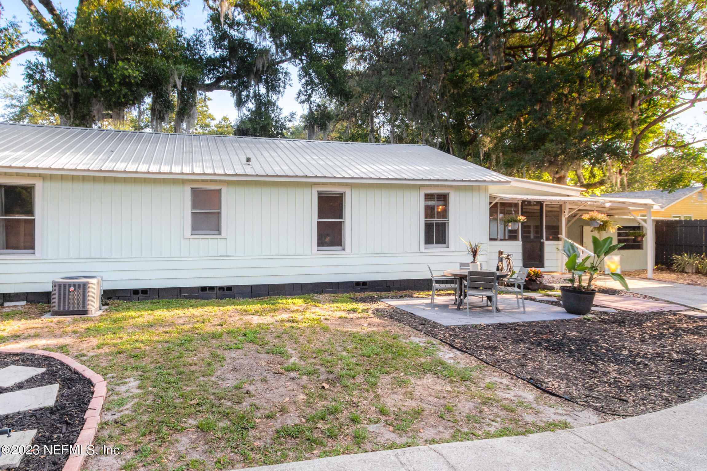 11 Newcomb Street St. Augustine, FL 32084 - Photo 29 of 35 a view of a house with swimming pool and sitting area