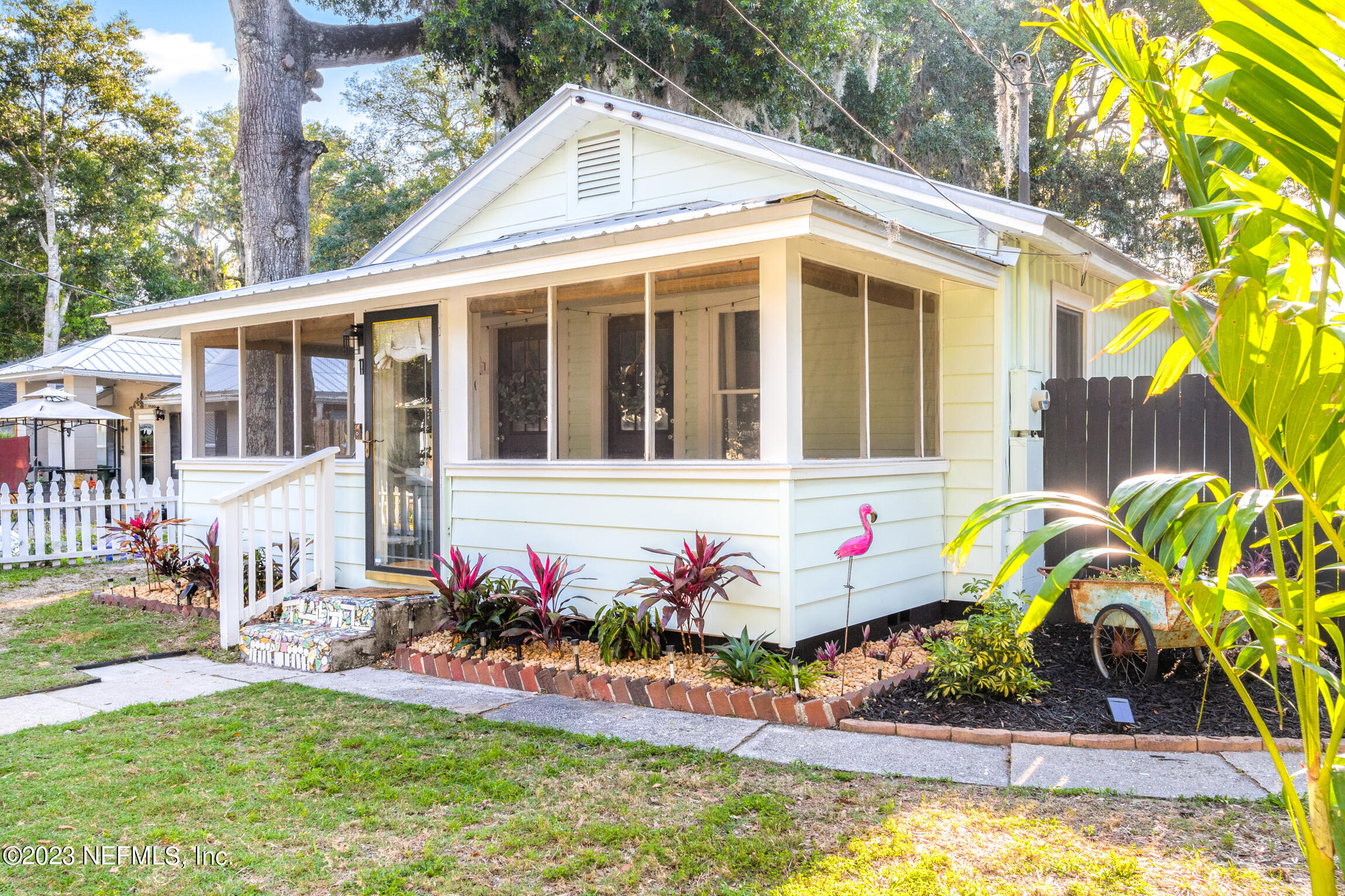 11 Newcomb Street St. Augustine, FL 32084 - Photo 30 of 35 a front view of a house with swimming pool