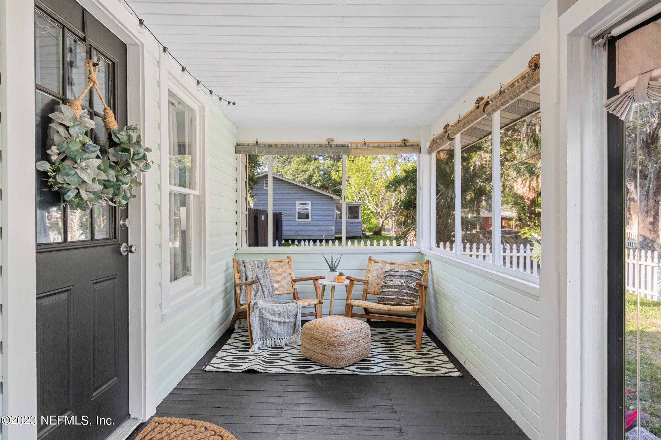 11 Newcomb Street St. Augustine, FL 32084 - Photo 5 of 35 a living room with furniture and a large window