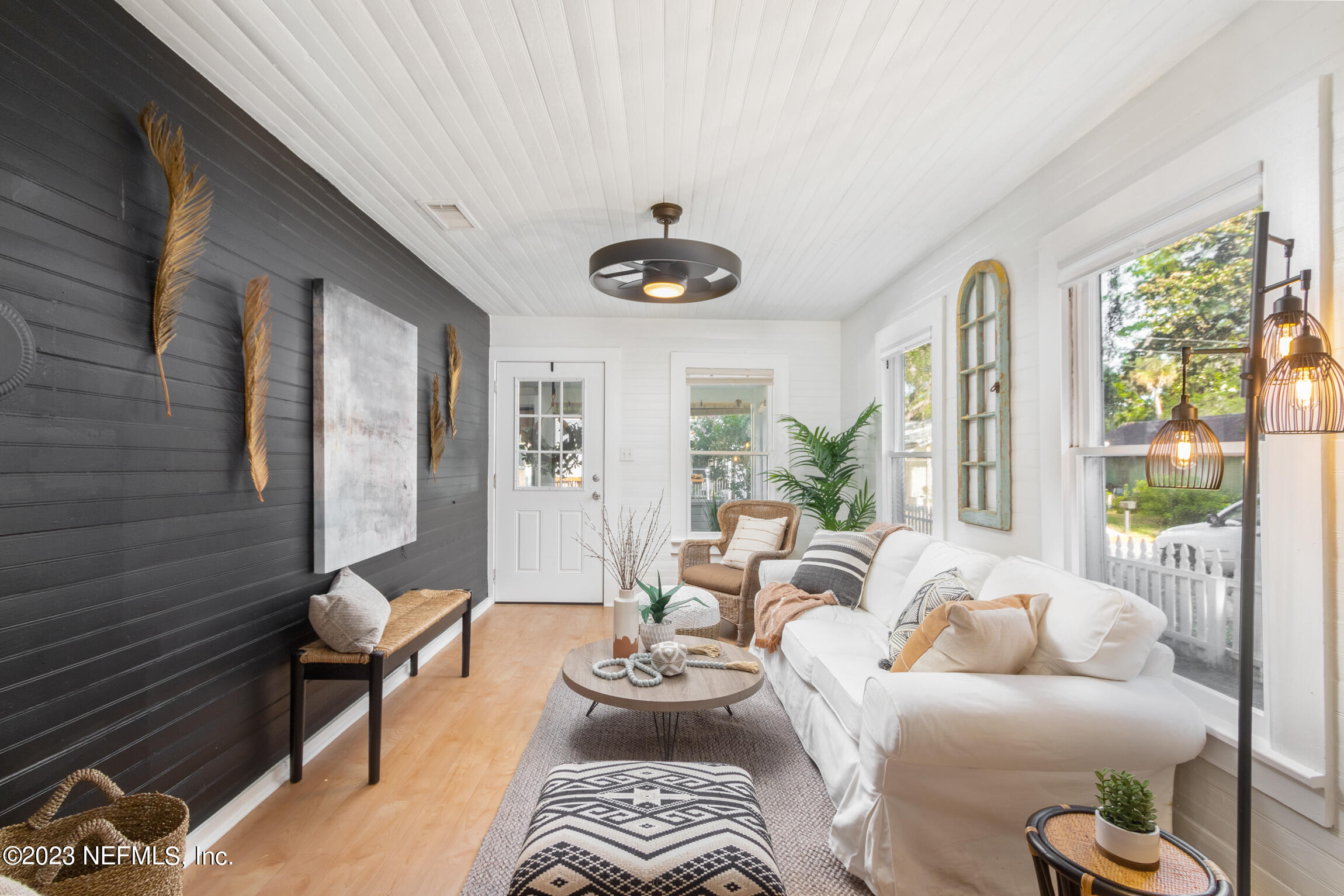 11 Newcomb Street St. Augustine, FL 32084 - Photo 6 of 35 a living room with furniture and a large window