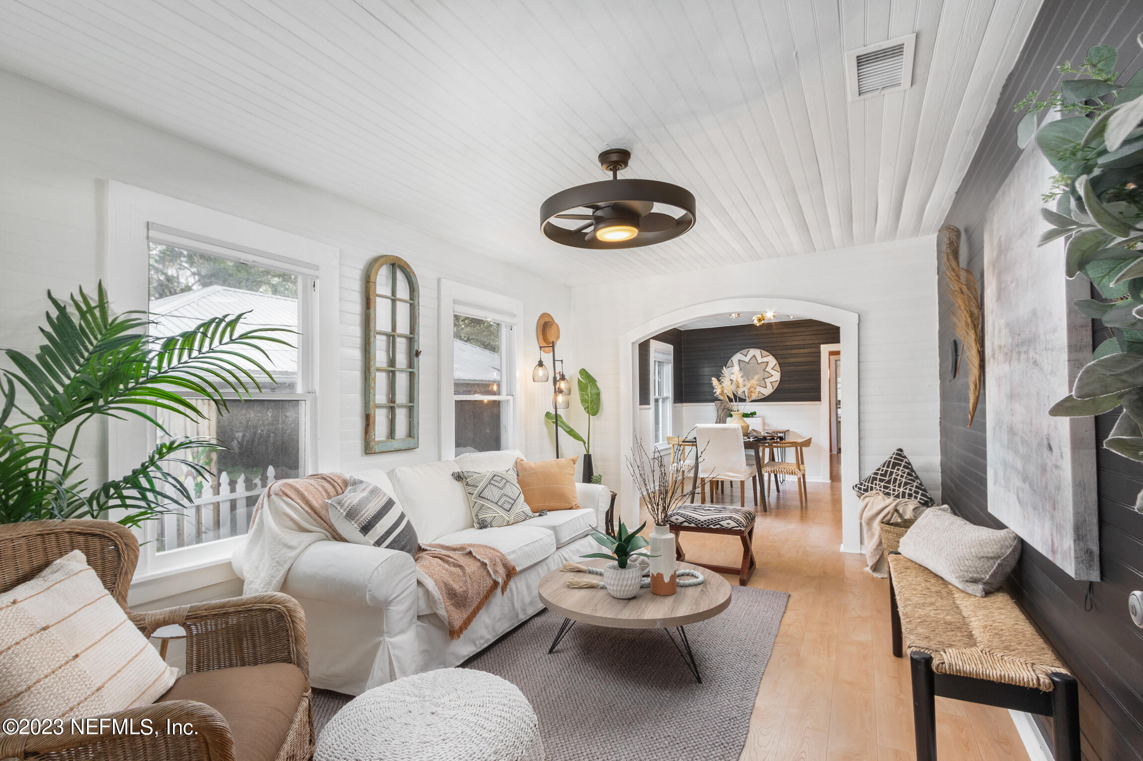 11 Newcomb Street St. Augustine, FL 32084 - Photo 7 of 35 a living room with furniture and a large window