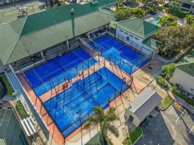 a view of a backyard with sitting area