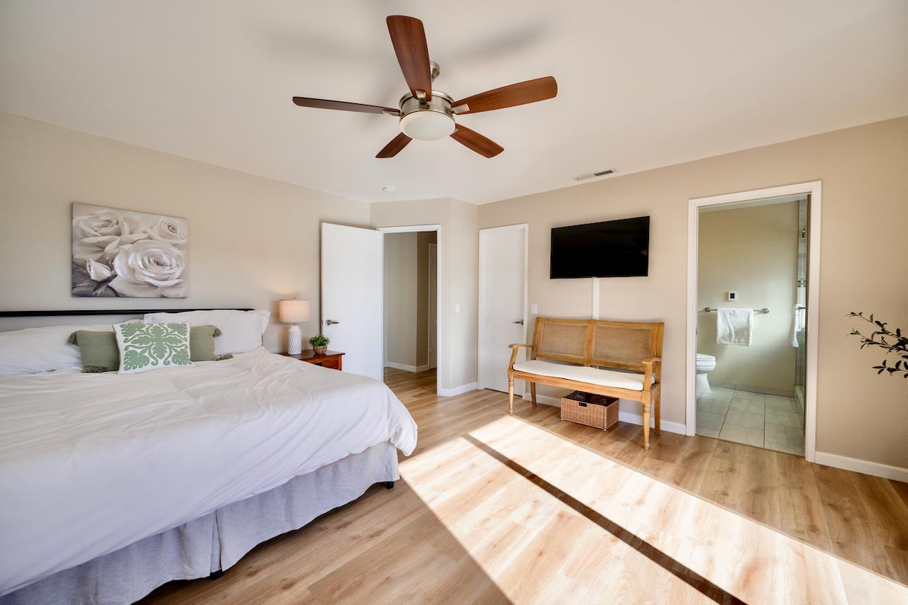 155 Rabbits Run Road Santa Cruz, CA 95060 - Photo 55 of 113 a bedroom with a bed and a flat screen tv