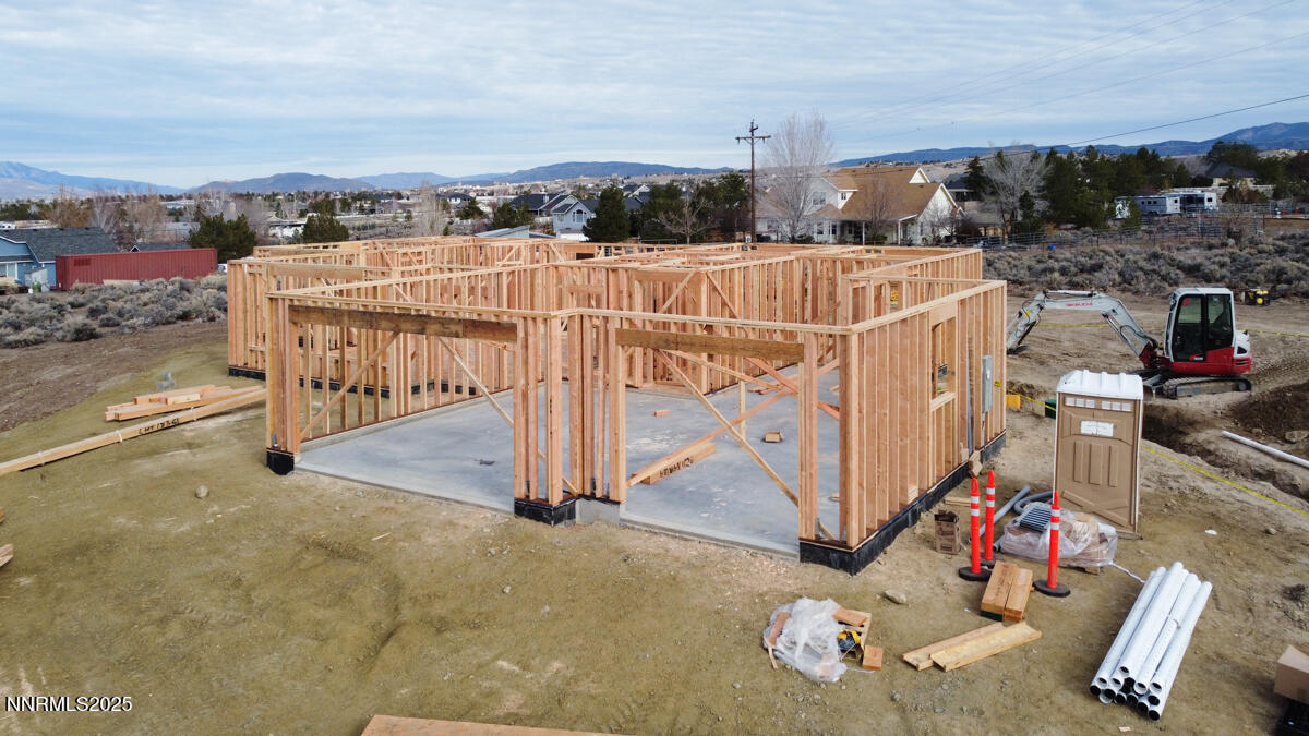 a view of a terrace with lawn chairs