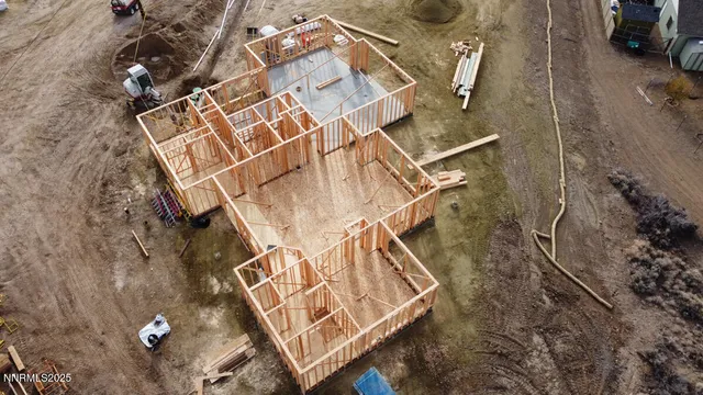 an aerial view of a house with roof deck