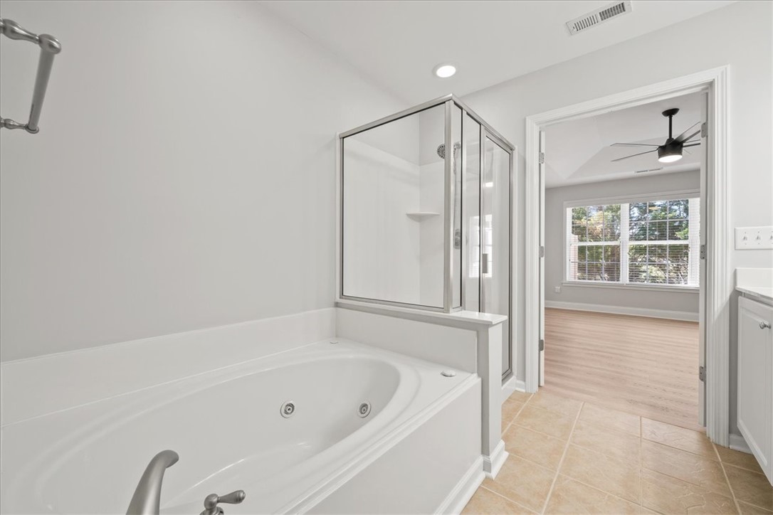 100 Shipyard Circle Anderson, SC 29621 - Photo 23 of 40 Relax in the soaking tub of this inviting bathroom, adjacent to a bright and airy room.