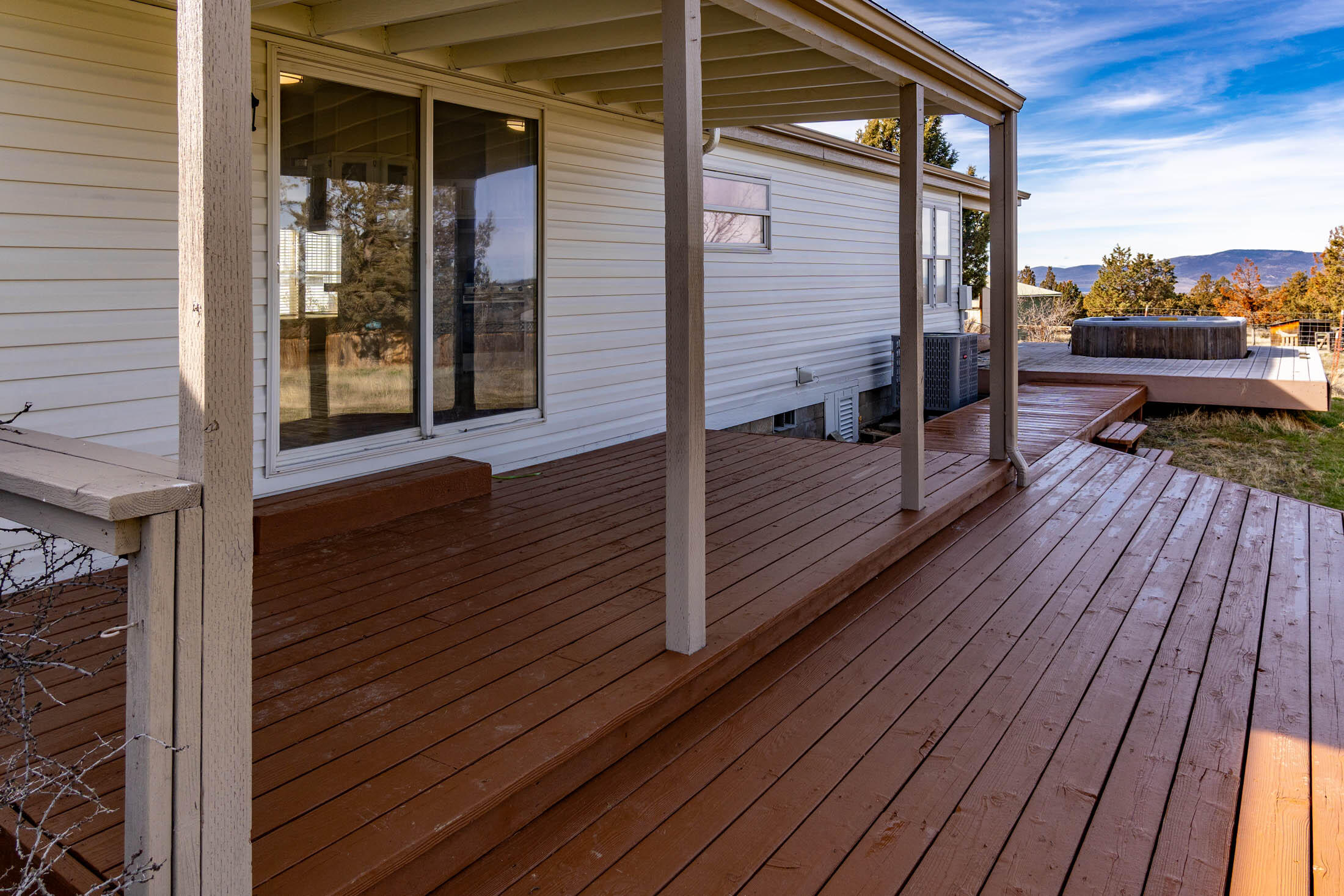 10113 Ridgeview Road Prineville, OR 97754 - Photo 19 of 31 a view of a balcony with wooden floor
