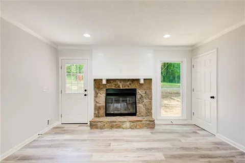 a view of a yard with a tree