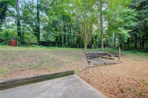 a view of backyard with green space