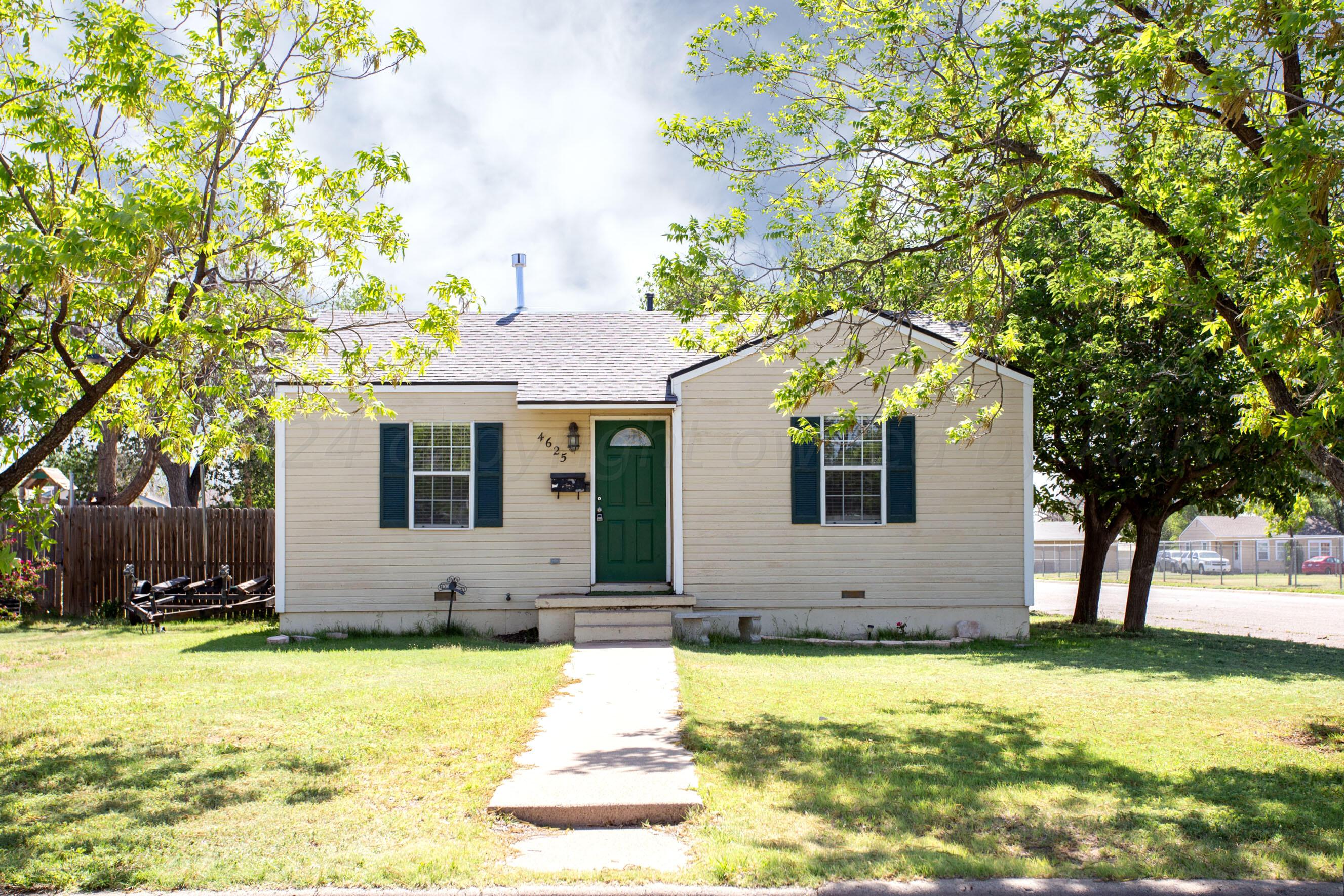 4625 South Travis Street Amarillo, TX 79110 - Photo 1 of 24 a front view of house with yard