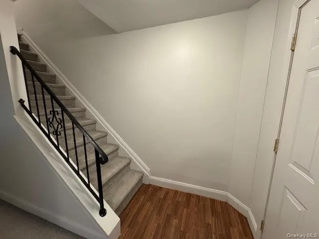 a view of a hallway with staircase