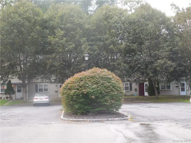 a view of a outdoor space with a tree