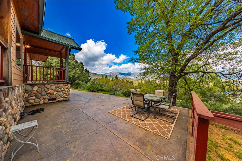 55511 Way Cool Way Wishon, CA 93669 - Photo 1 of 1 a view of a chairs and tables in the patio and a fountain