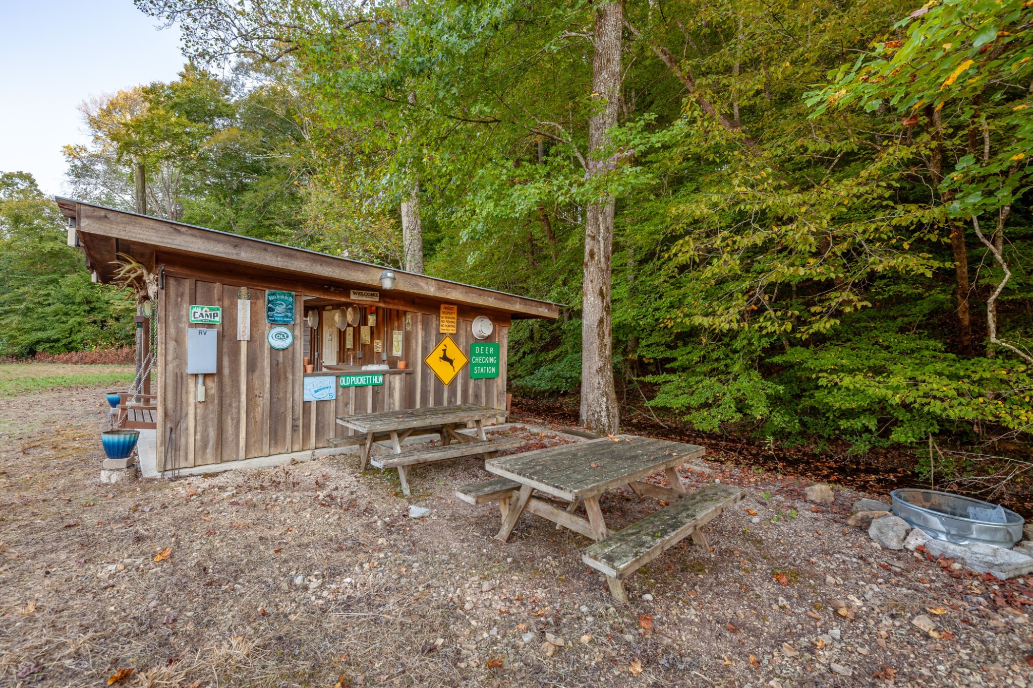0 Puckett Hollow Road Centerville, TN 37033 - Photo 21 of 53 a backyard of a house with table and chairs
